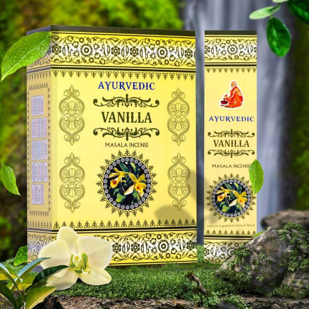 Ayurvedic Vanilla Masala Incense packaging with green leaves and flowers in the background