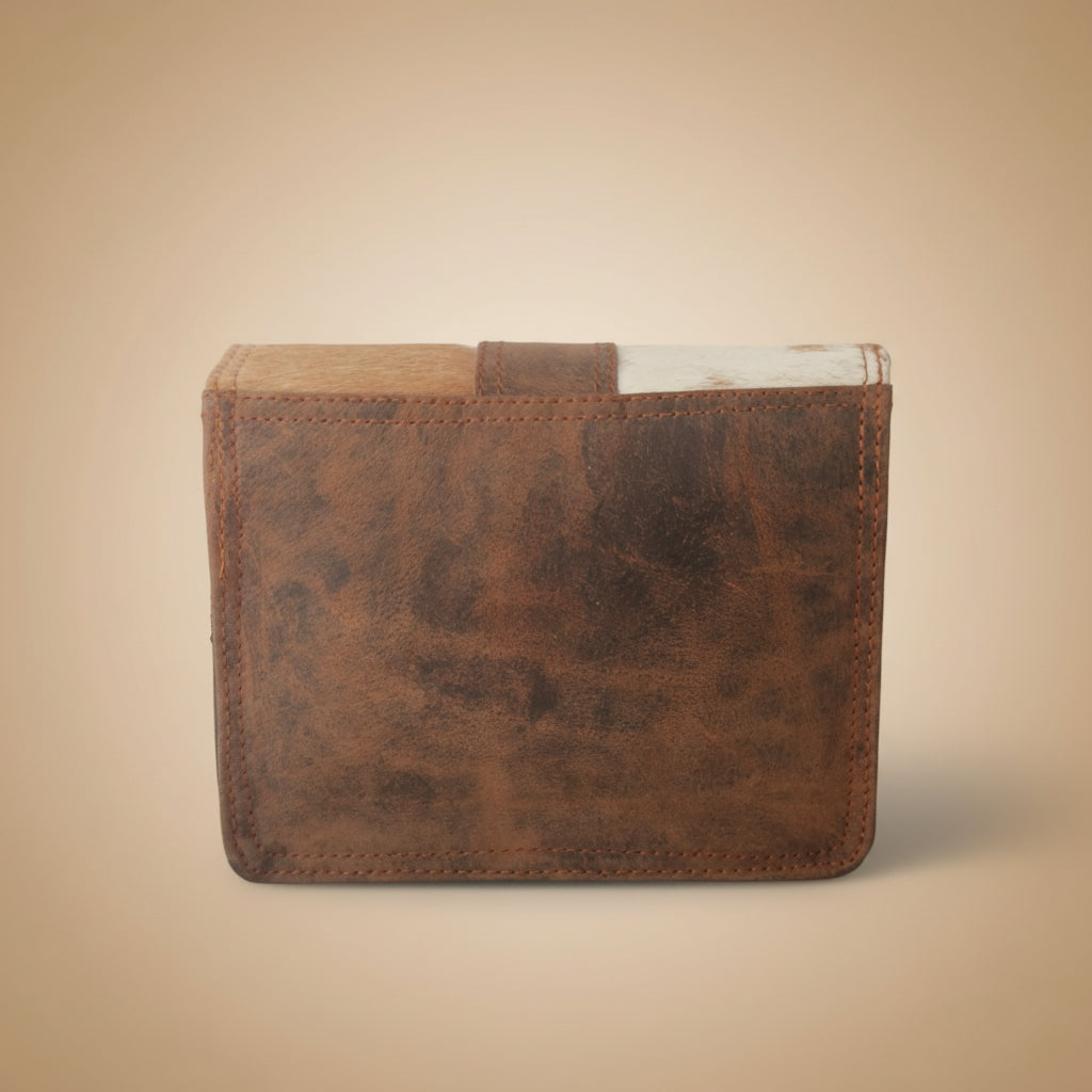 Brown leather-bound book on a white background