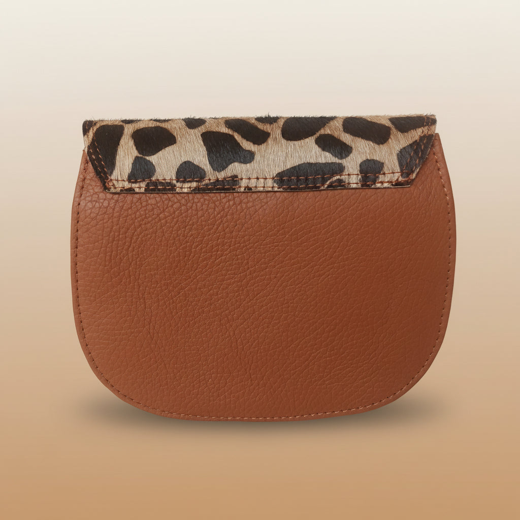 Brown leather pouch with leopard print corner on a white background