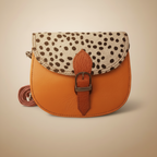 Small orange bag with a patterned flap on a light gray background