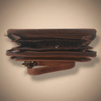 Brown leather wallet on a white background