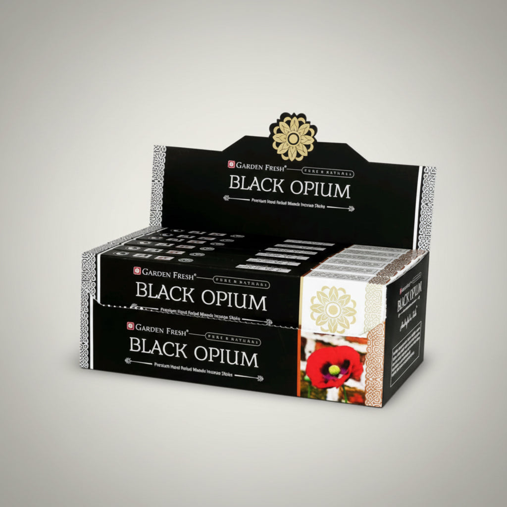 Coffret de parfum Guerlain Black Opium sur fond blanc