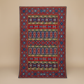 Decorative rug with geometric pattern on a beige background