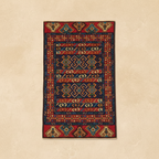 Decorative rug with geometric pattern on a beige wall