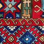 Two colorful geometric-patterned rugs with intricate designs.