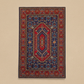 Decorative rug with intricate patterns in a room with stairs and a railing.