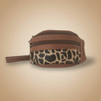 Leopard print toiletry bag with brown accents on a white background