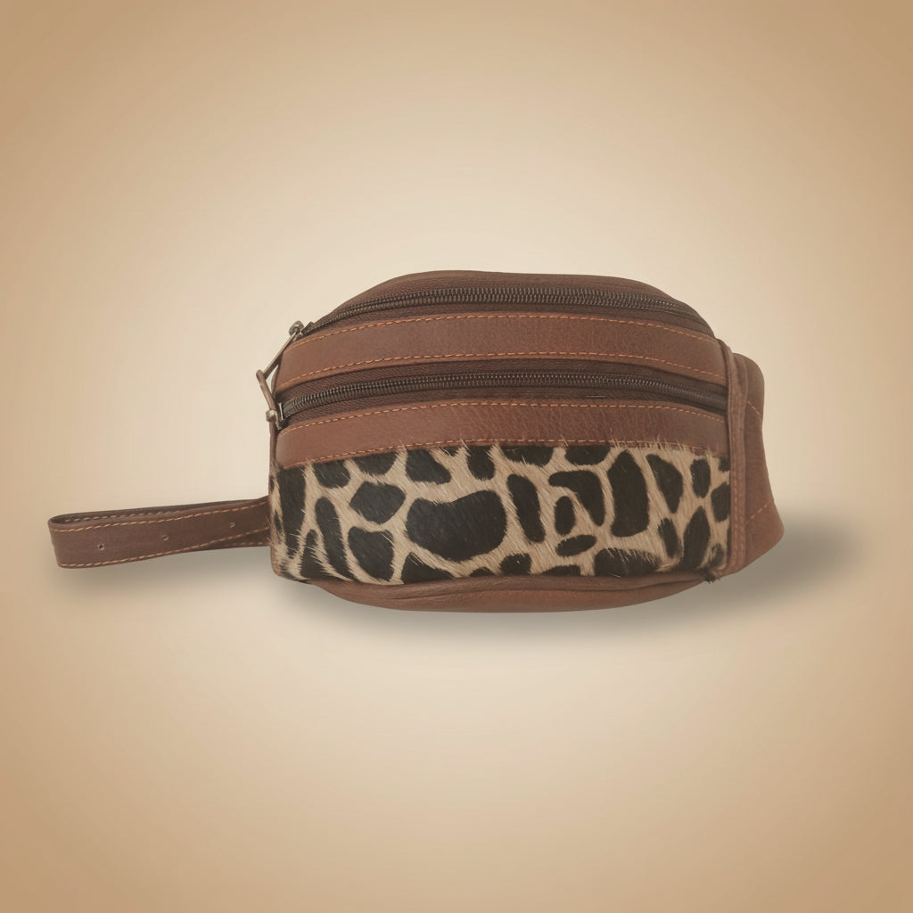 Leopard print toiletry bag with brown accents on a white background