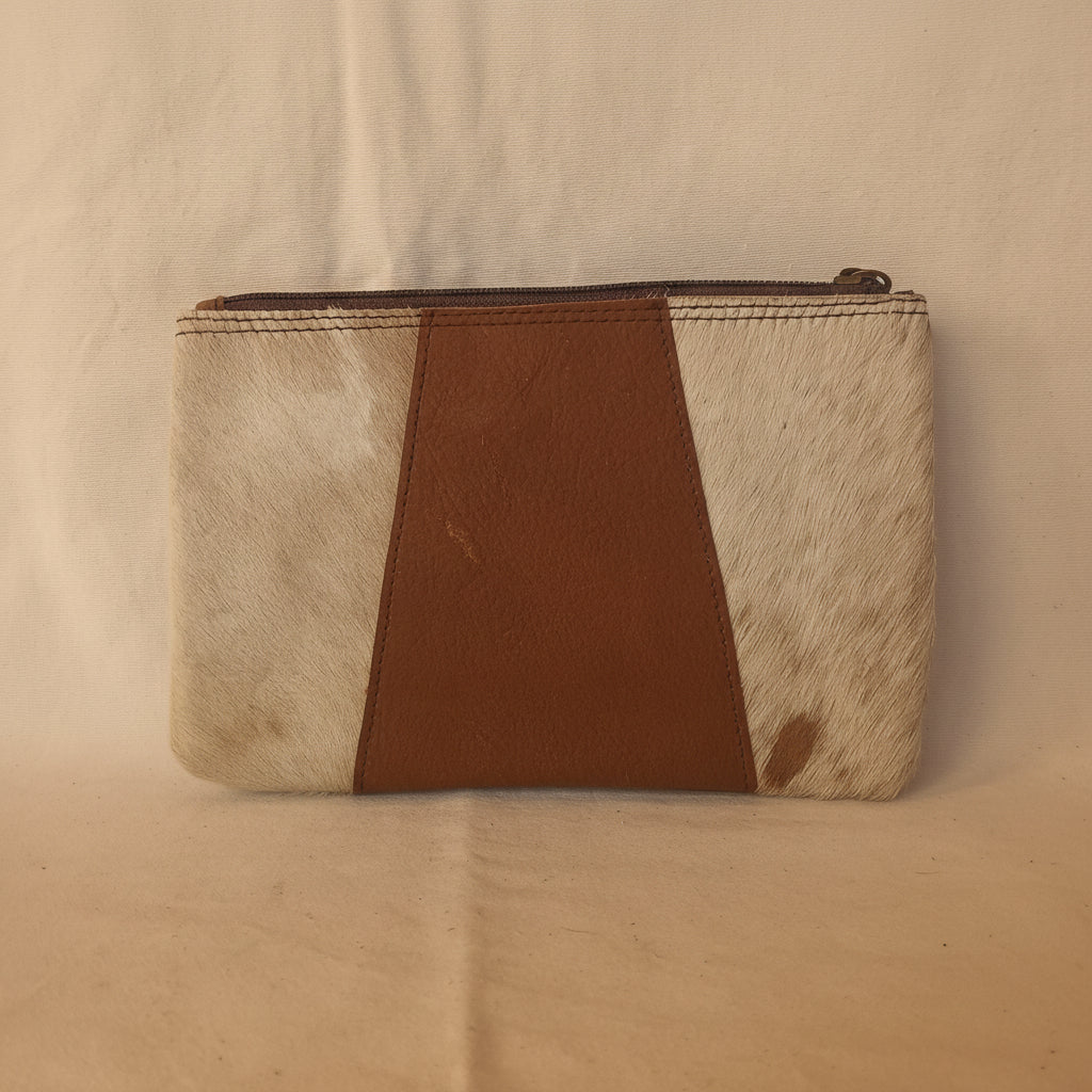 Notebook with cowhide leather cover on a white background