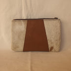 Notebook with cowhide leather cover on a white background
