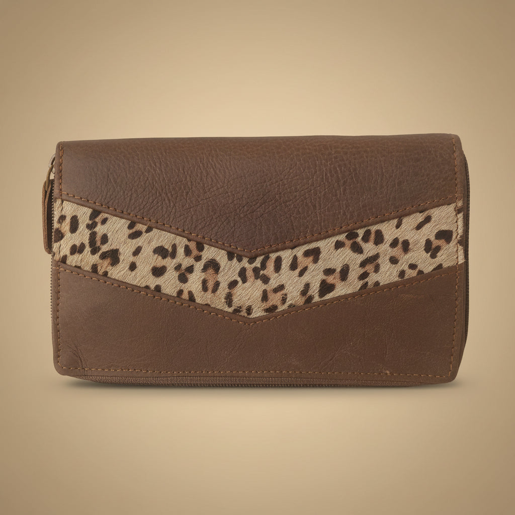 Brown leather wallet with a cheetah print strap on a white background