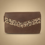 Brown leather wallet with a cheetah print strap on a white background