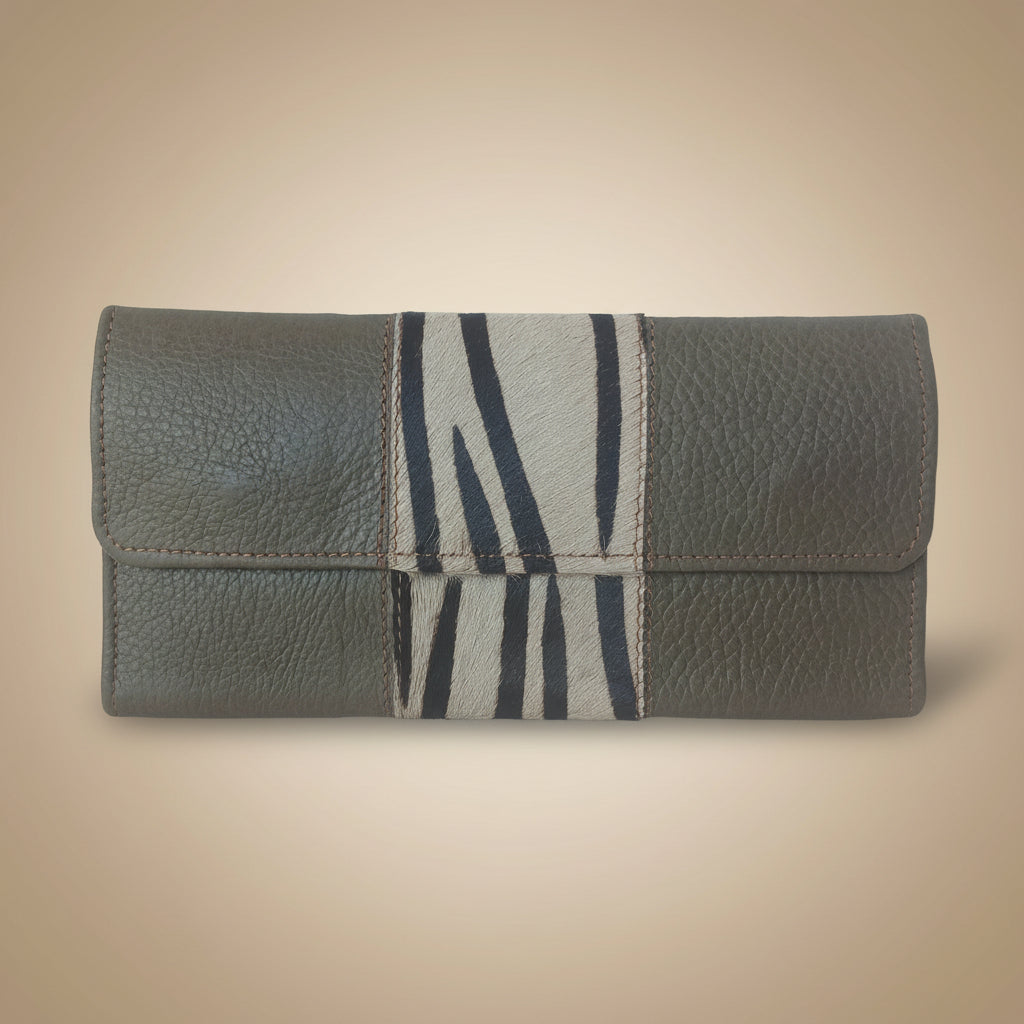 Gray leather wallet with zebra pattern on a light gray background