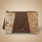 Pouch with brown and beige cowhide leather design on a beige background