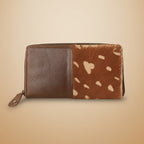 Wallet with brown and white pattern on a light gray background