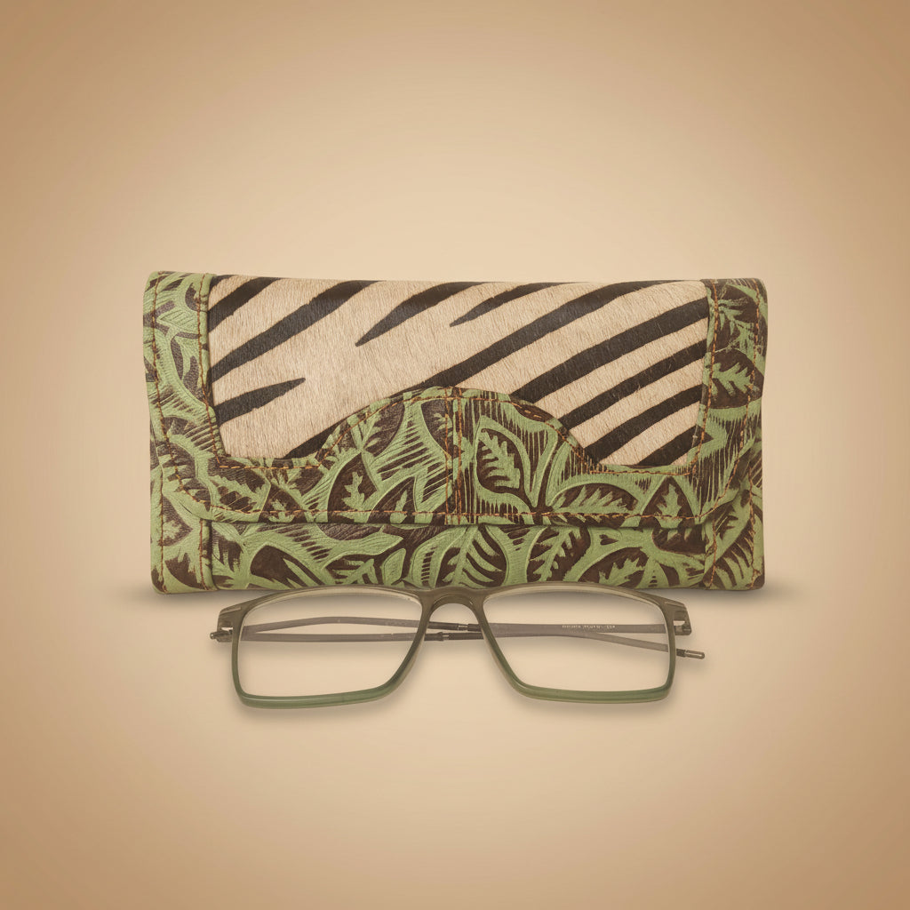 Patterned eyeglass case with a pair of glasses on a white background