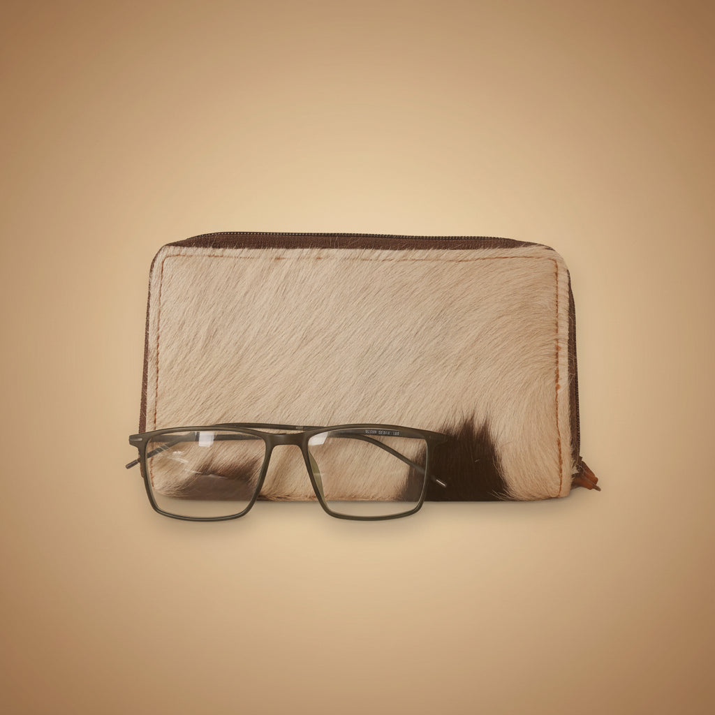 Black-framed glasses on a wooden surface
