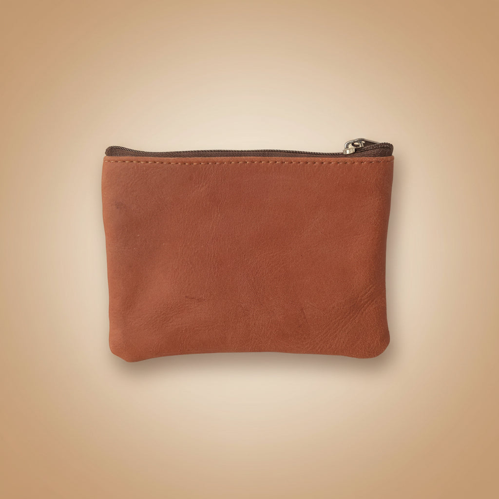 Brown leather pouch with a zipper on a light gray background