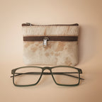 Small pouch with a zipper and a pair of glasses on a light gray surface