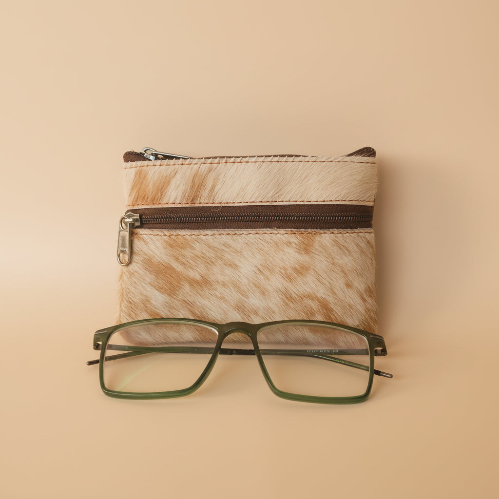 Small zippered pouch with glasses on a light gray background
