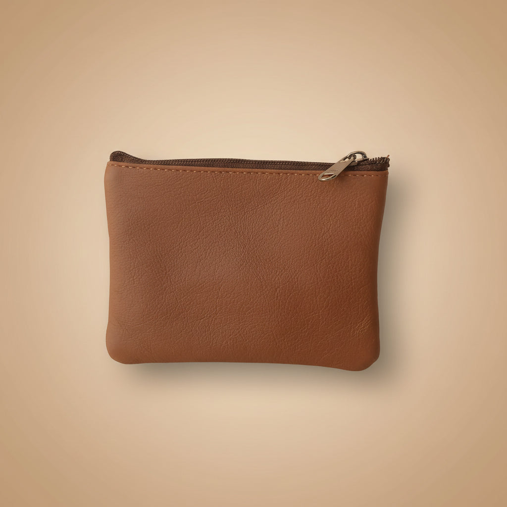 Brown leather pouch with a zipper on a light gray background
