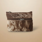 Fur pouch with a zipper on a light gray background