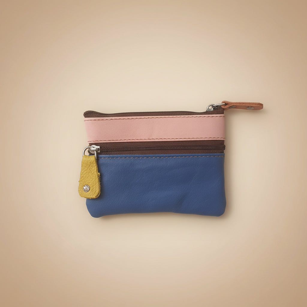 Small blue pouch with pink and brown accents on a light gray background