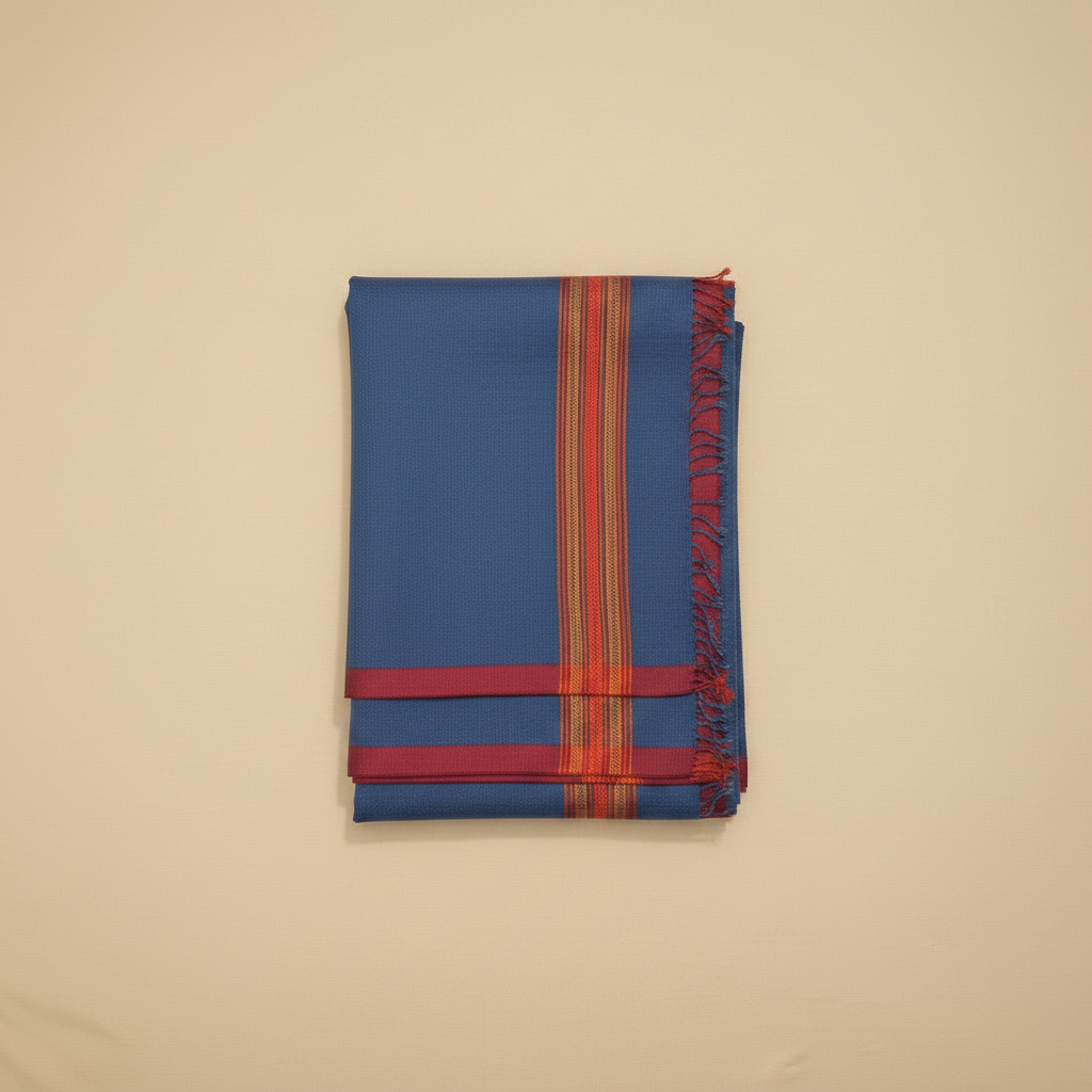 Folded blue fabric with red and orange stripes on a beige background