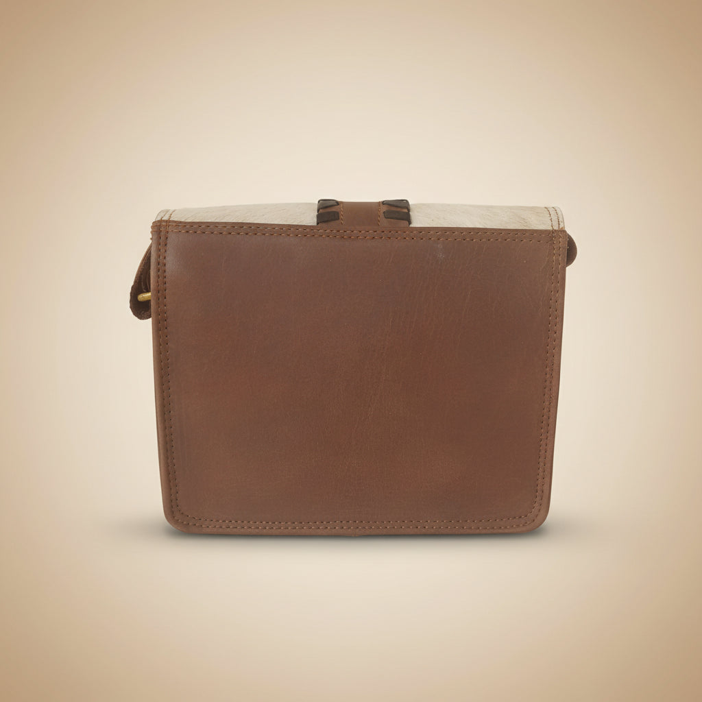 Brown leather-bound book or notebook on a white background