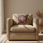 Beige armchair with a decorative pillow in a living room setting