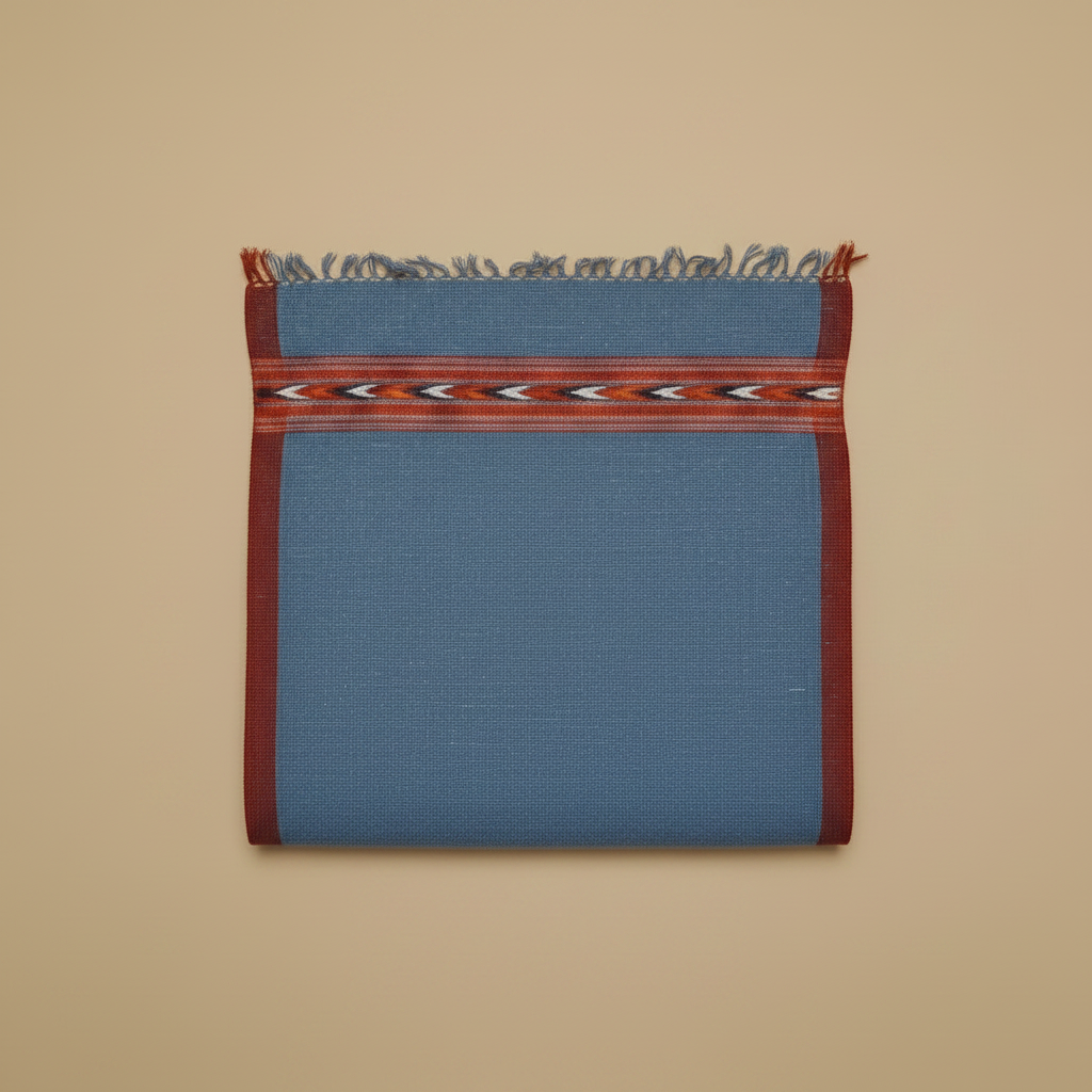 Blue fabric with a red border and pattern on a beige background