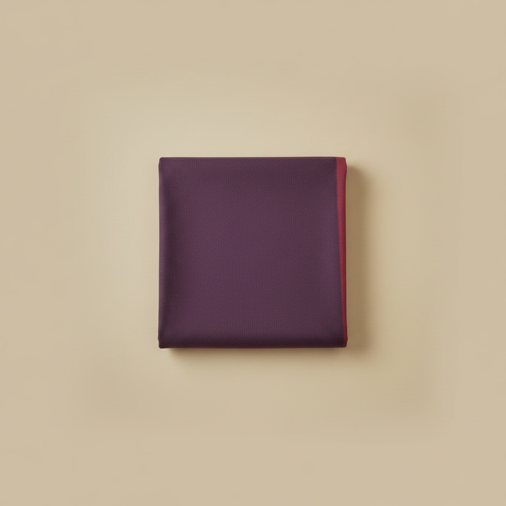 Folded purple fabric on a beige background