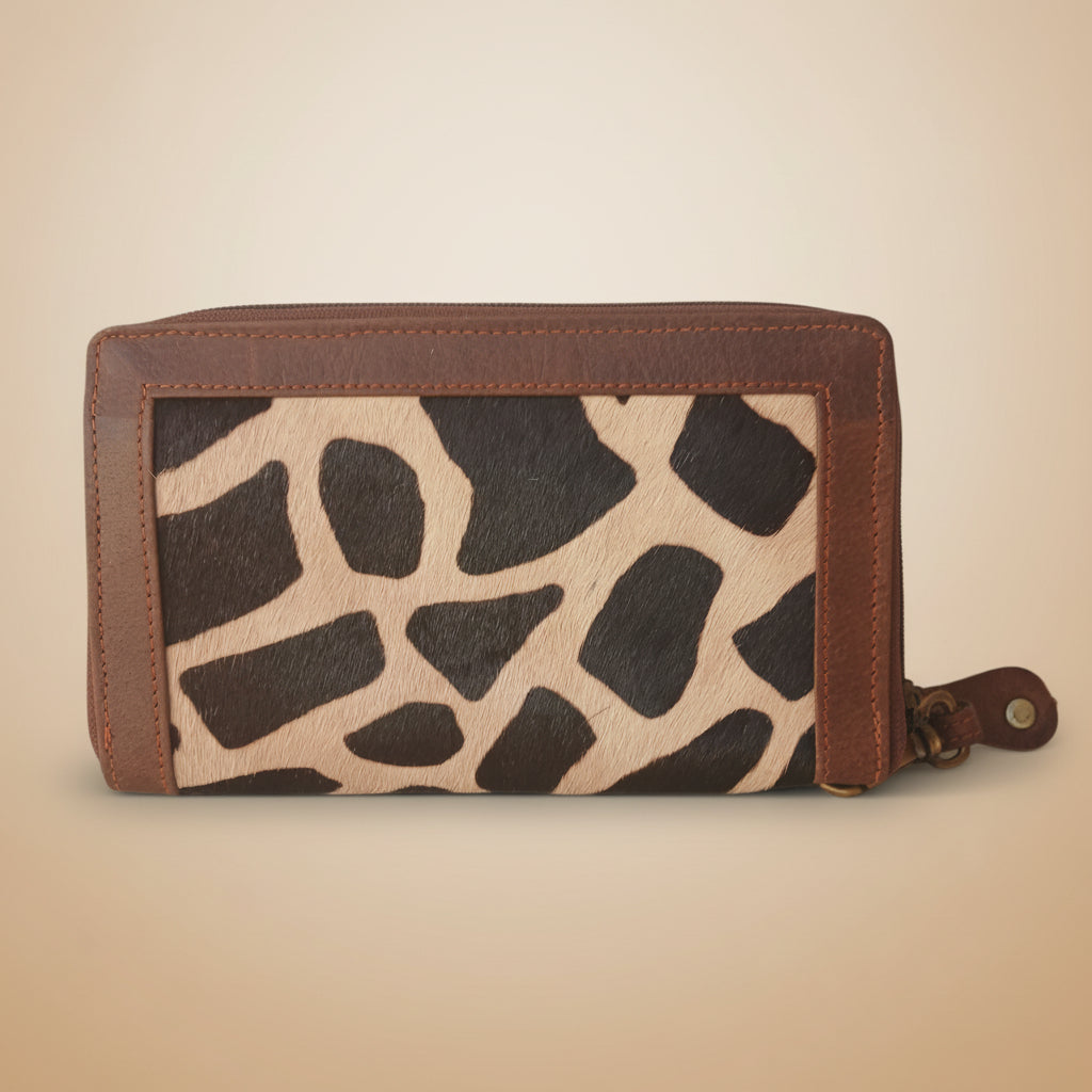 Wallet with giraffe pattern on a white background
